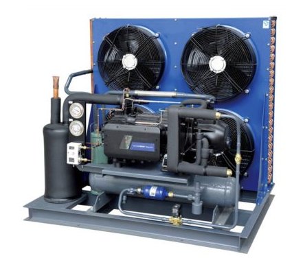 A remote condensing unit rejects heat outside the building instead of into the room.
